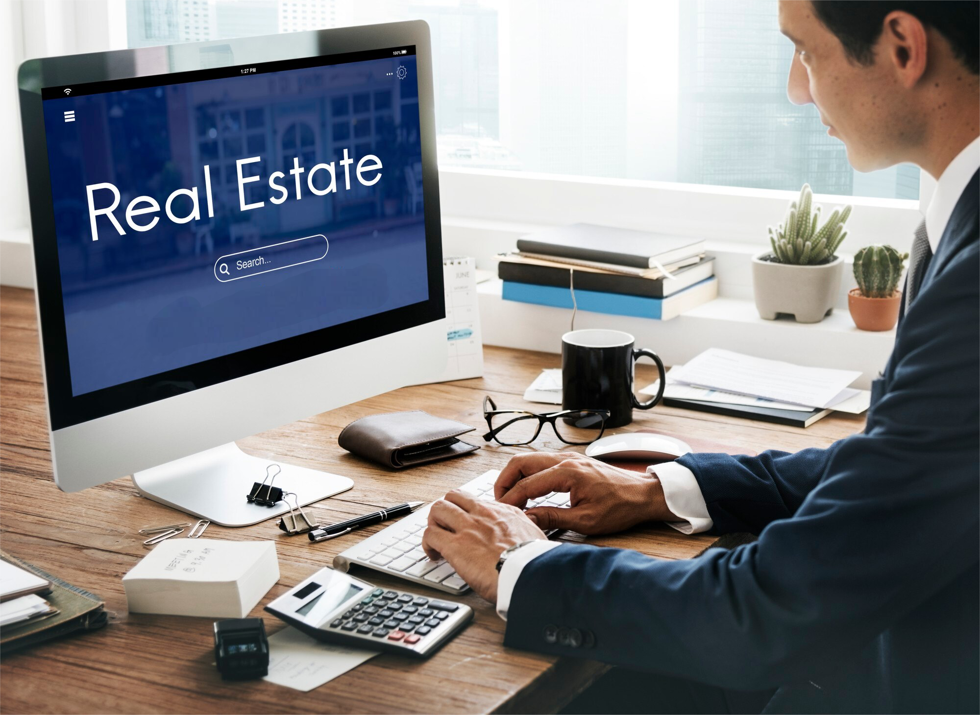 Businessman researching Hyderabad NRI real estate